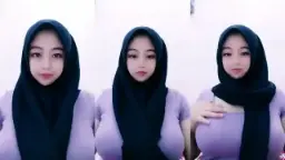 Ukhti Fira Bergaun Ungu Ketat Dengan Hijab Yang Menggoda