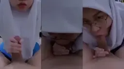 Gadis Berhijab Berkacamata Menggoda Dengan Mulut Penuh Nafsu