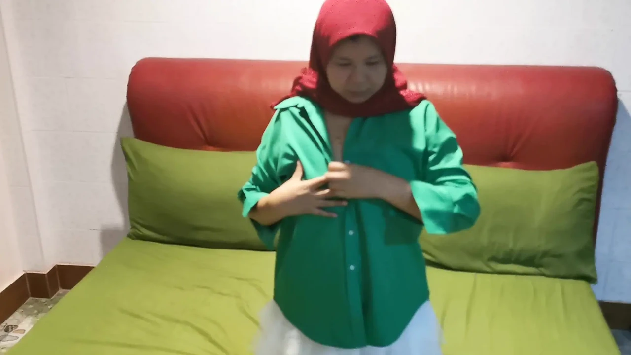 Hijab Girl Plucks Under A White Skirt