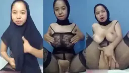 Lusi Berjilbab Hitam Menggairahkan, Mengocok Basah Dengan Desahan Menggoda